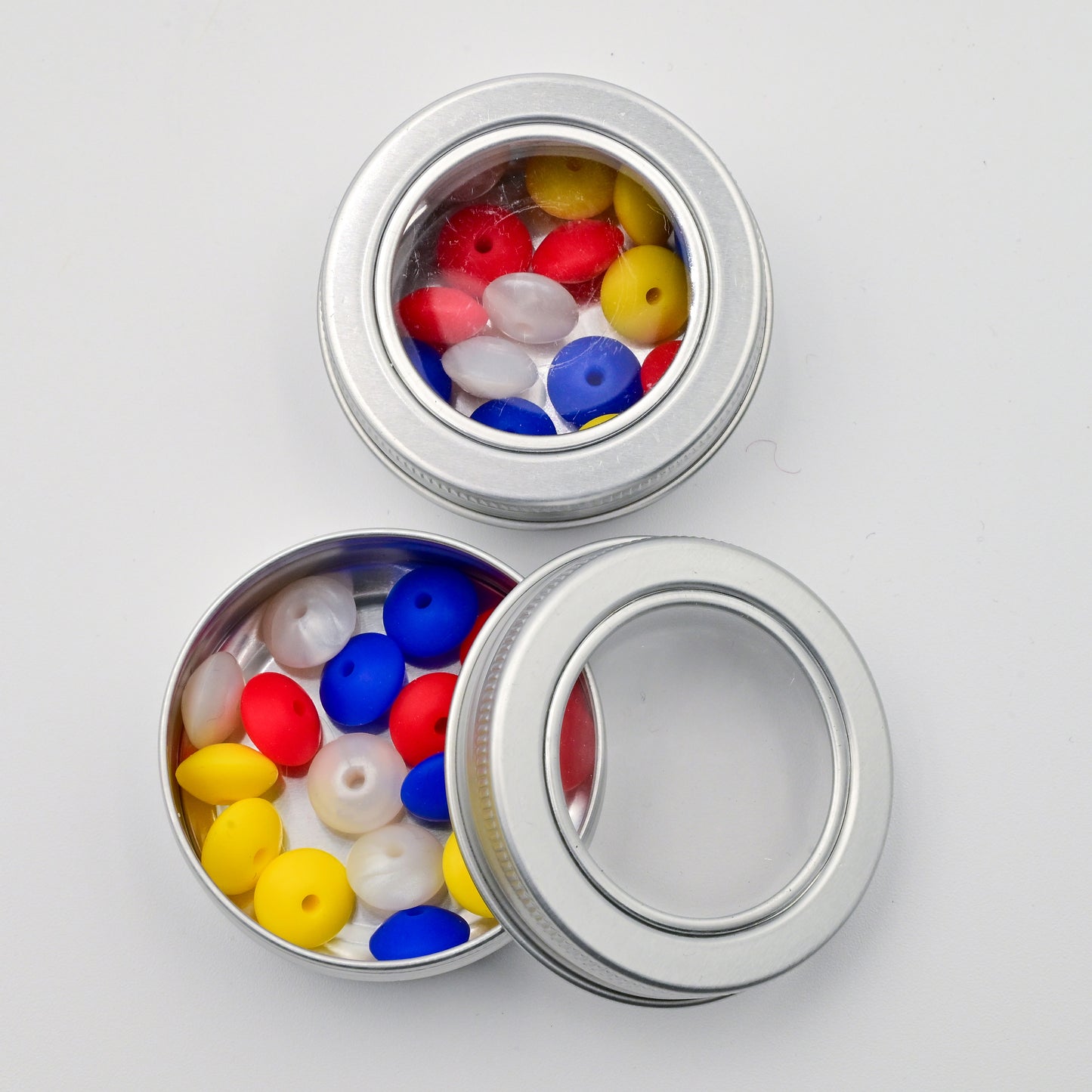 Needle Stoppers - Tin of 8 pairs, Flying Saucers