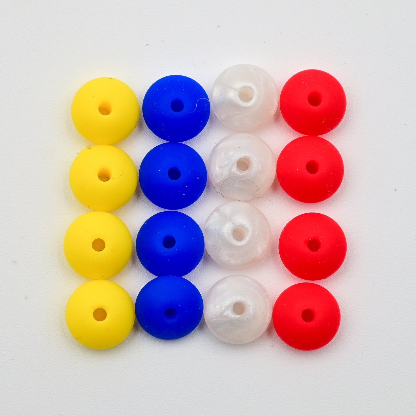Needle Stoppers - Tin of 8 pairs, Flying Saucers