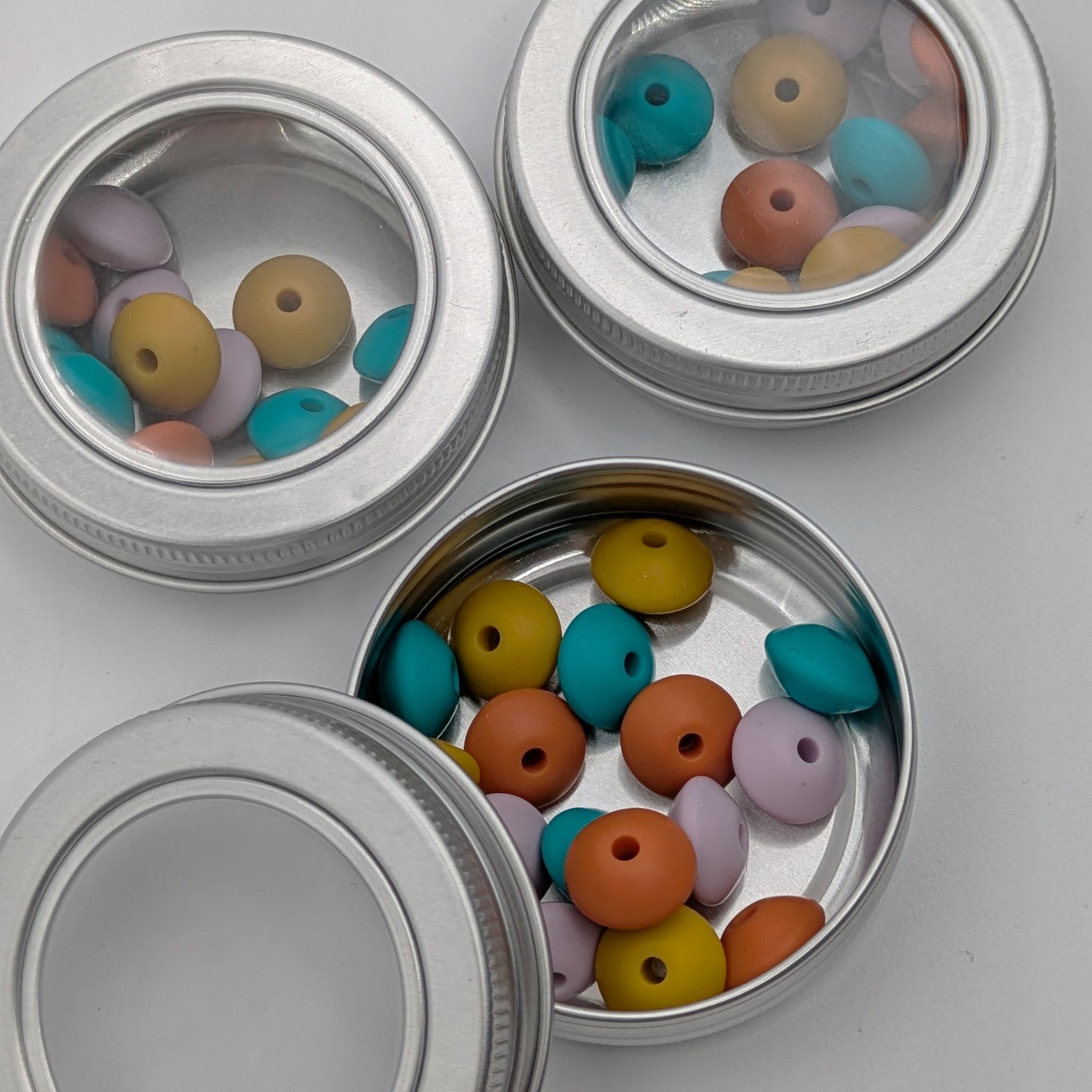 Needle Stoppers - Tin of 8 pairs, Flying Saucers